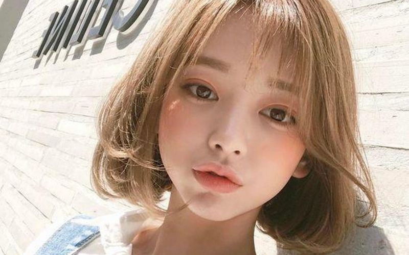 Tóc uốn phồng ngang vai xinh xắn