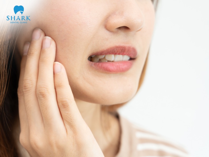 Possible risks after gum contouring include tooth sensitivity and pain