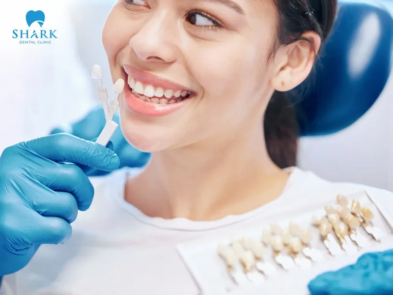 The patient will have the temporary denture removed and proceed with final crown placement