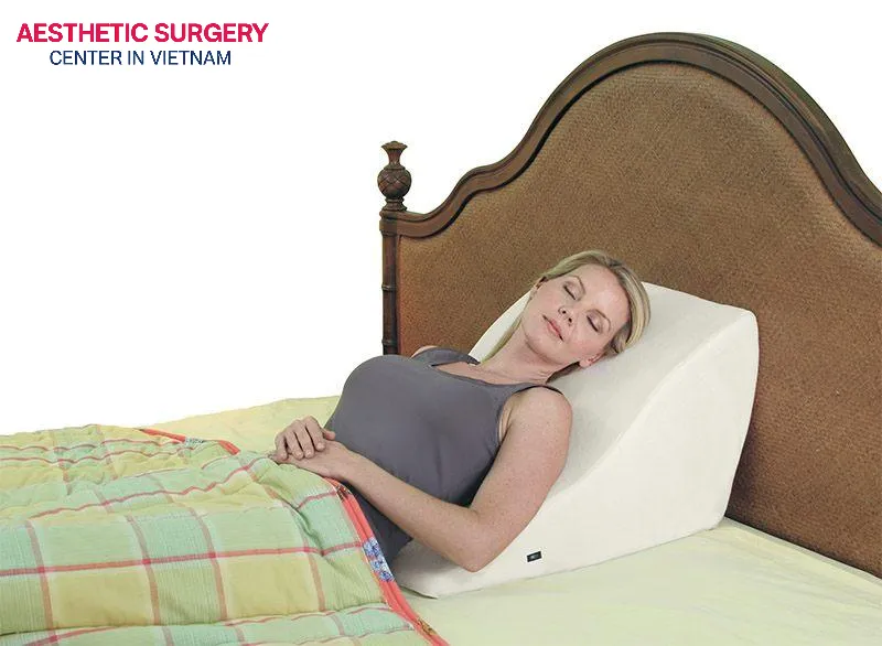 After facelift surgery, you should sleep with your head elevated to reduce blood pressure and help prevent swelling and bruising around the incision area.