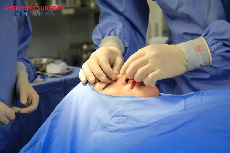 The surgeon is performing a natural rhinoplasty procedure on the patient.