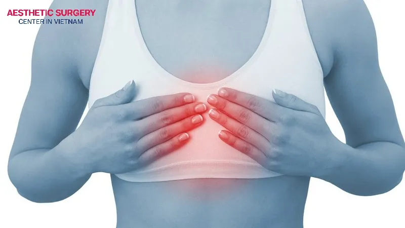 Unusual firmness, aching pain, and sensory changes are key signs indicating capsular contracture