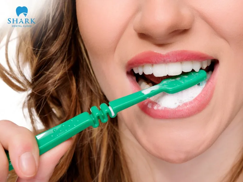 You should maintain a regular brushing habit after getting porcelain crowns
