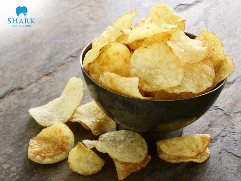 You should choose thinly sliced chips and remove any sharp edges to minimize the risk of food particles getting stuck in the brackets