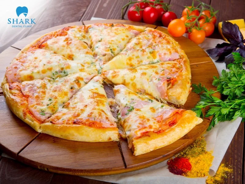 Individuals with braces should cut pizza into bite-sized pieces and avoid biting into the crust with their front teeth