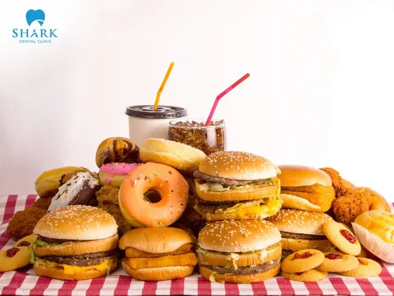 People with braces should limit fast food as much as possible because it increases the risk of cavities and gum disease