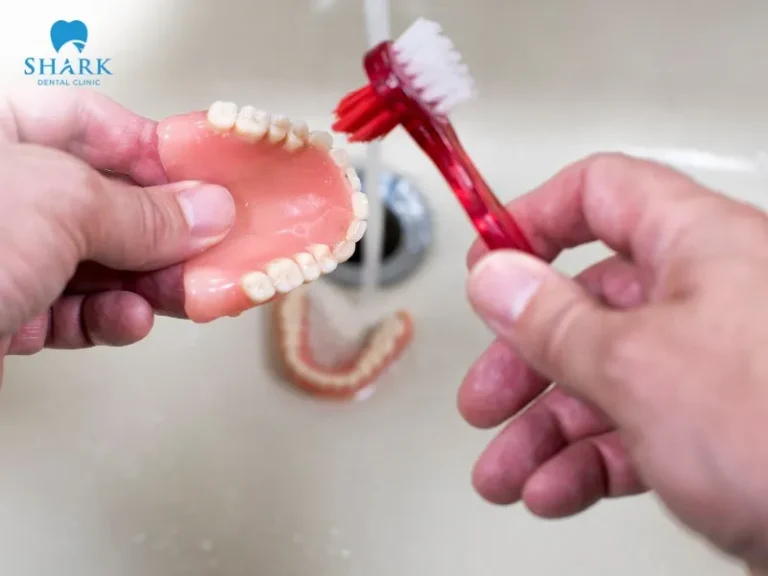 You should clean your dentures daily to remove plaque on the surface
