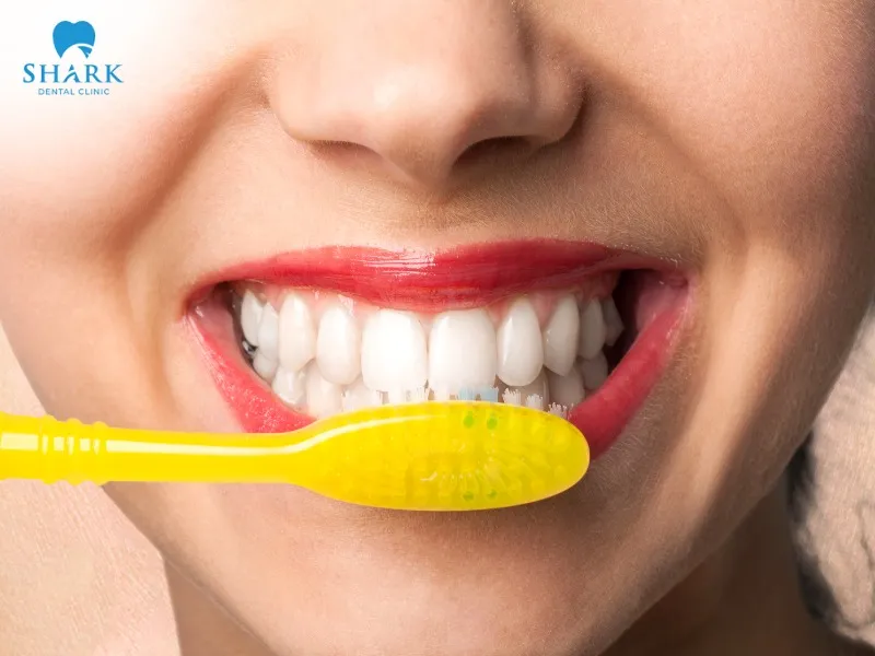 To prevent a black tooth after root canal treatment, you should maintain proper and consistent oral hygiene habits