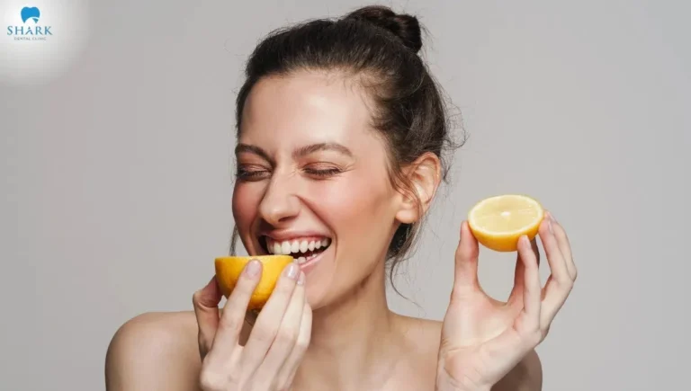 Sour foods should be avoided after dental implant surgery, as their high acid content may cause irritation and delay wound healing