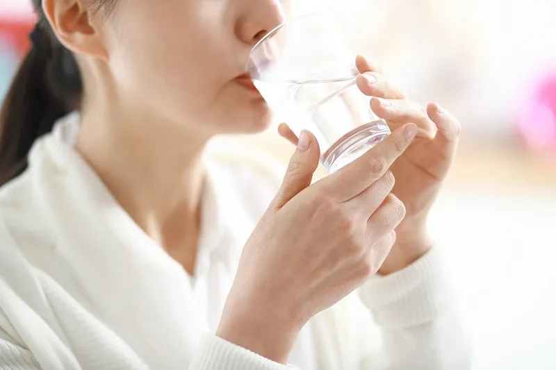 Drink plenty of water to replenish and rehydrate your teeth after whitening