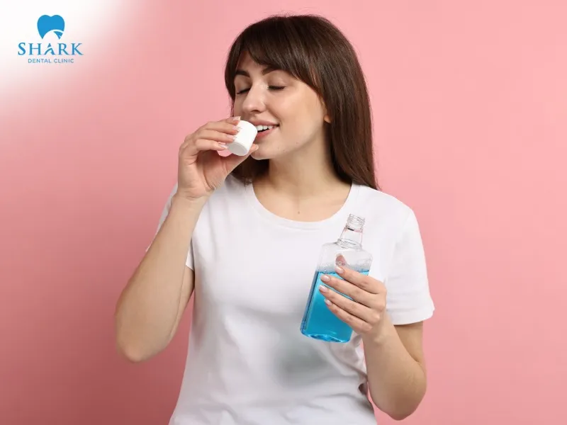 In addition to brushing, people who have undergone a root canal and received a temporary filling should rinse their mouth daily