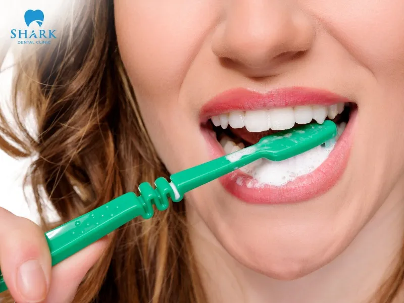 You may brush your teeth before applying whitening strips