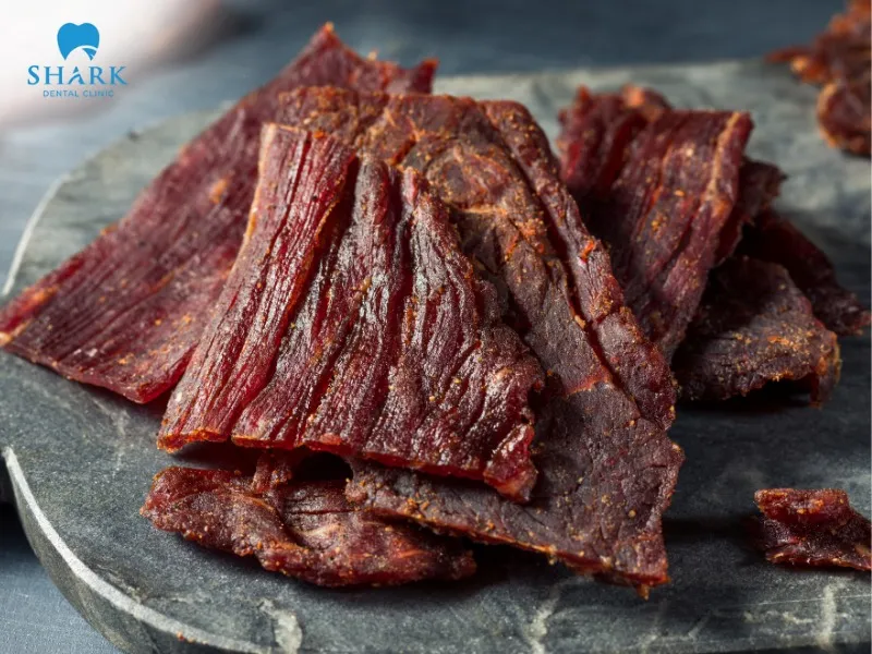 During the first 7 days after implant placement, you should limit tough and hard foods such as dried beef