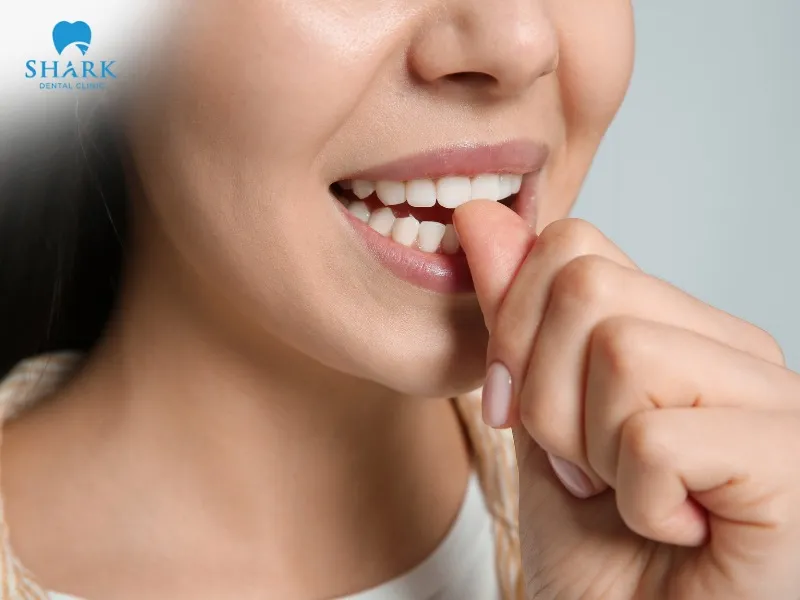Teeth grinding or frequent nail-biting can cause tooth discomfort