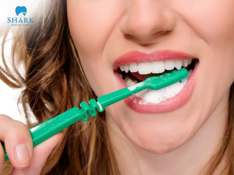 You should use toothpaste with gentle ingredients designed for sensitive teeth