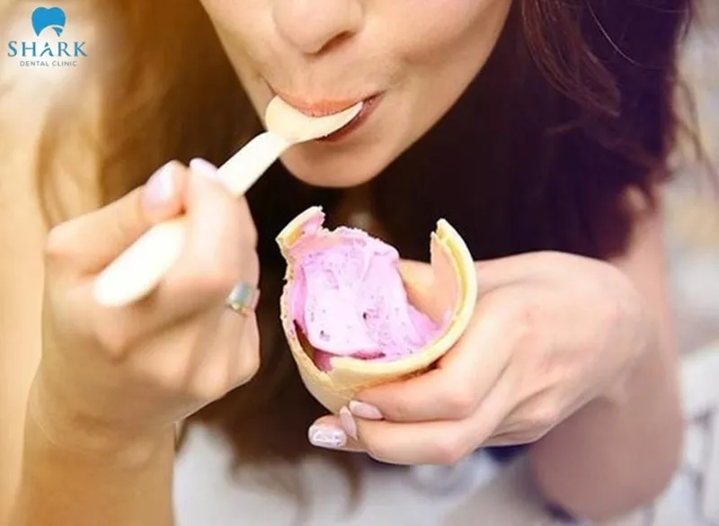You should wait a few days until the tooth sensitivity has completely subsided and the local anesthetic has worn off before eating ice cream