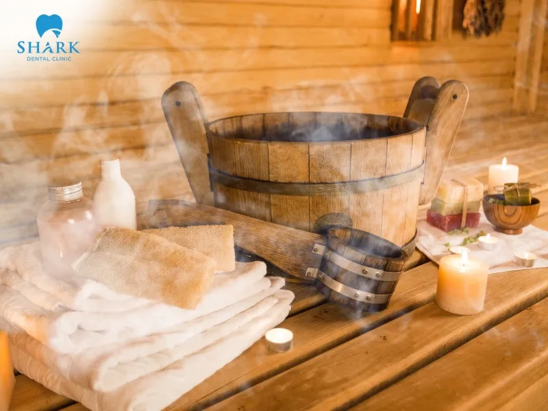 After getting a root canal at the dental clinic, you should avoid taking very hot showers or going to the sauna