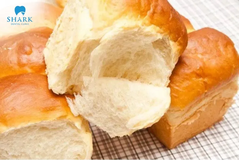 You should prioritize choosing soft bread types without a hard or crispy crust to ensure safety for the wound during the healing process