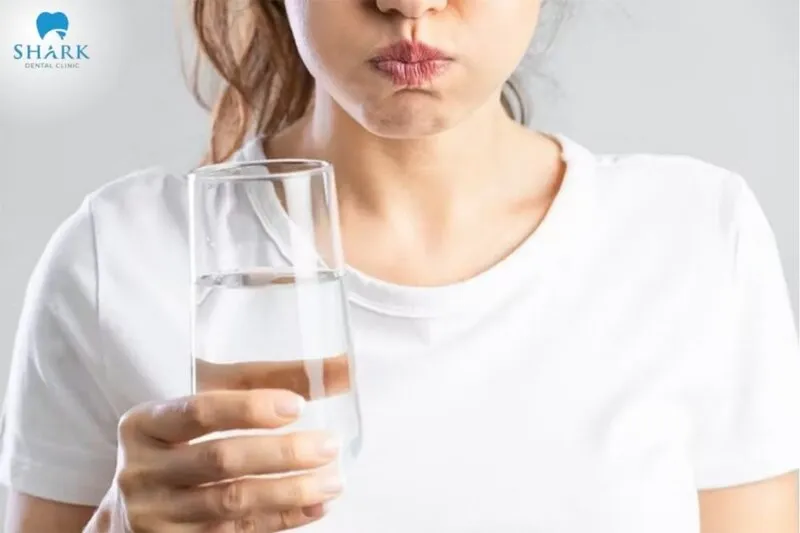 You can brush your teeth gently after tooth extraction, but absolutely avoid forceful spitting, as this can dislodge the blood clot