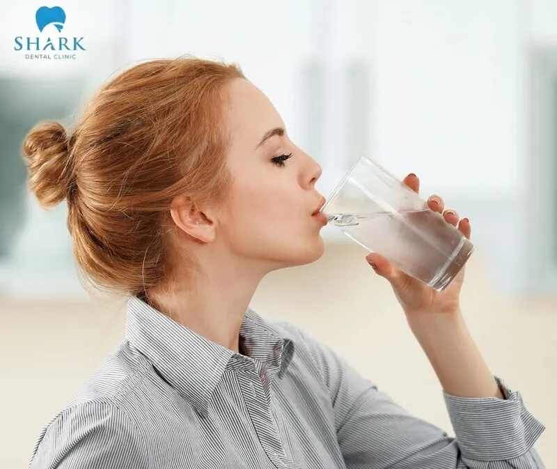 After tooth extraction, you should drink fluids gently and minimize any impact on the wound