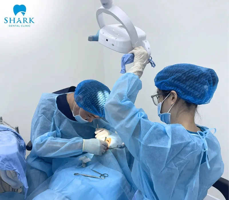 After tooth extraction, the formation of a blood clot and the white layer indicates that the healing process is progressing normally