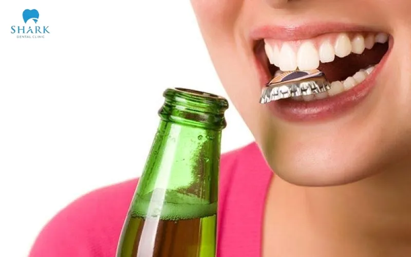 You should absolutely avoid using your teeth to open bottle caps, as this can negatively affect the lifespan of your veneers