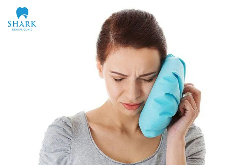 Applying ice to the cheek where the tooth was extracted can help reduce pain.