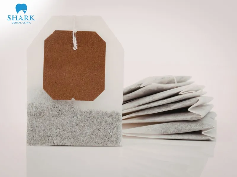 You can bite on or hold a warm, soaked black tea bag to help control bleeding effectively