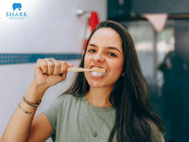 You should brush your teeth 2 to 3 times daily, paying attention to using a soft-bristle toothbrush to protect your enamel and gums