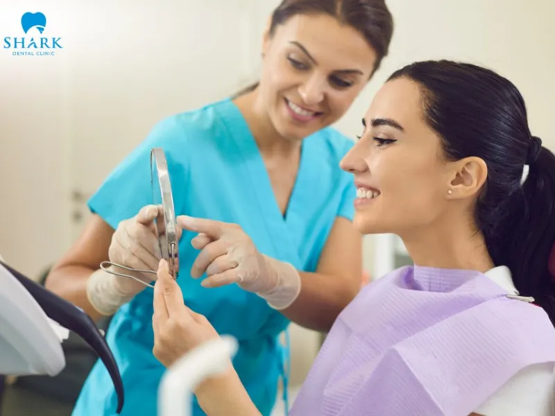 The dentist will take impressions of the patient’s natural dental arch to fabricate customized dentures