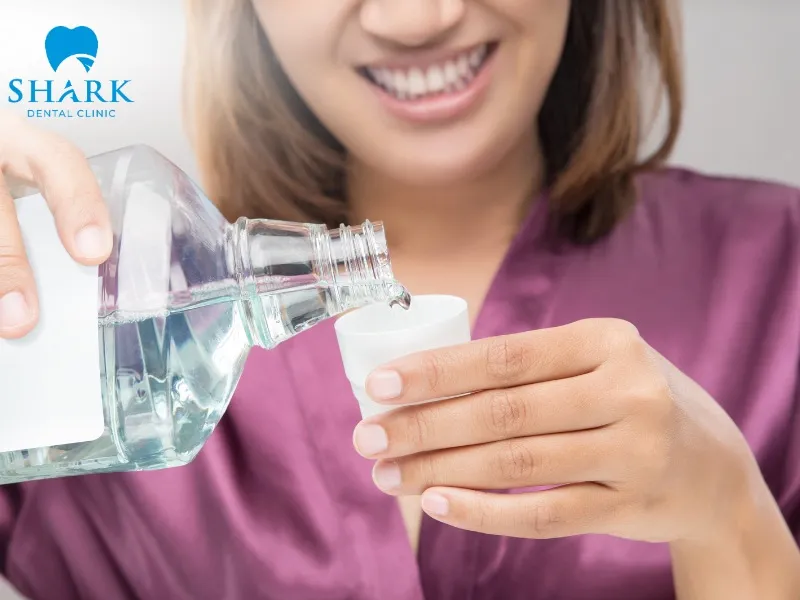 After the first 1–2 days following your dental procedure, you should rinse your mouth gently with salt water to help manage bad breath after tooth extraction
