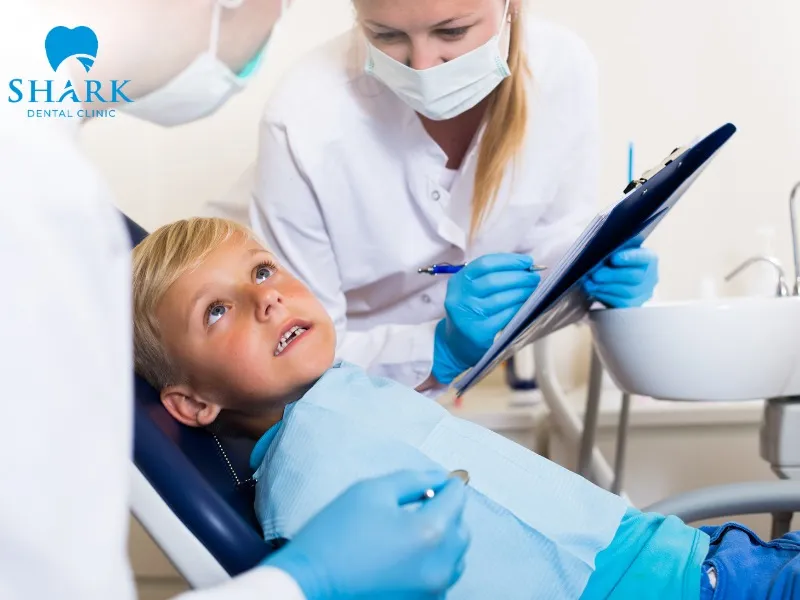 Instead of dental implant placement, children may use a space maintainer to preserve the gap safely and support proper dental development