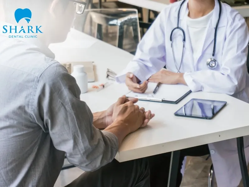 You should visit a reputable medical or dental facility immediately if you experience a high fever or swollen lymph nodes after tooth extraction
