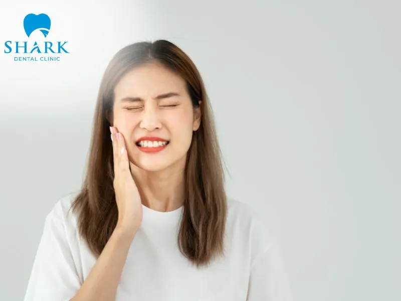 When a wisdom tooth erupts only partially, it can cause pain, discomfort, and irritation