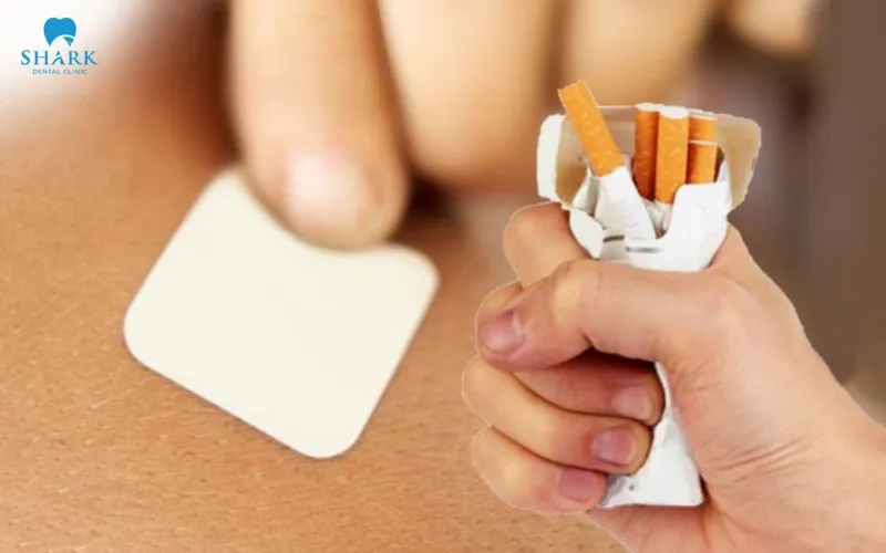 Nicotine patches, lozenges, or gum may be used temporarily to help control nicotine cravings and reduce direct smoke exposure during the dental implant recovery period