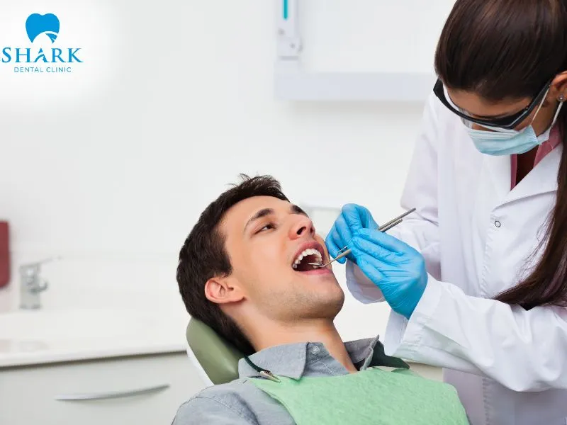 A dental examination and thorough oral cleaning are the first essential steps in the porcelain veneer placement procedure