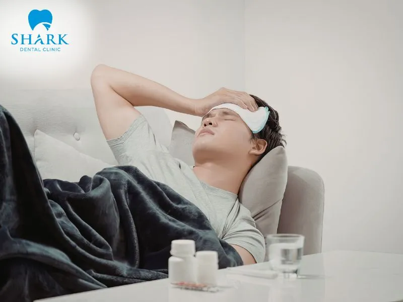 Fever and fatigue together can serve as important warning signs of a dental implant infection that calls for prompt professional evaluation