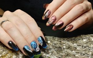 Các mẫu nail mắt mèo với hoa văn nổi bật
