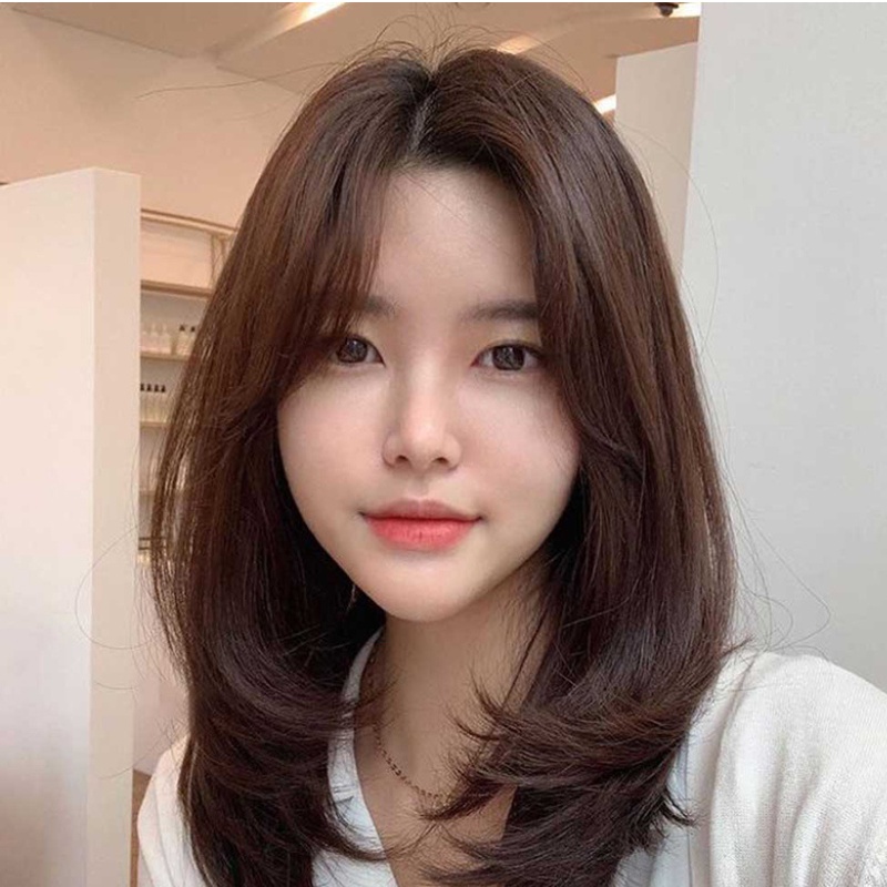 Tóc phồng giúp dáng mặt quả lê thon gọn hơn