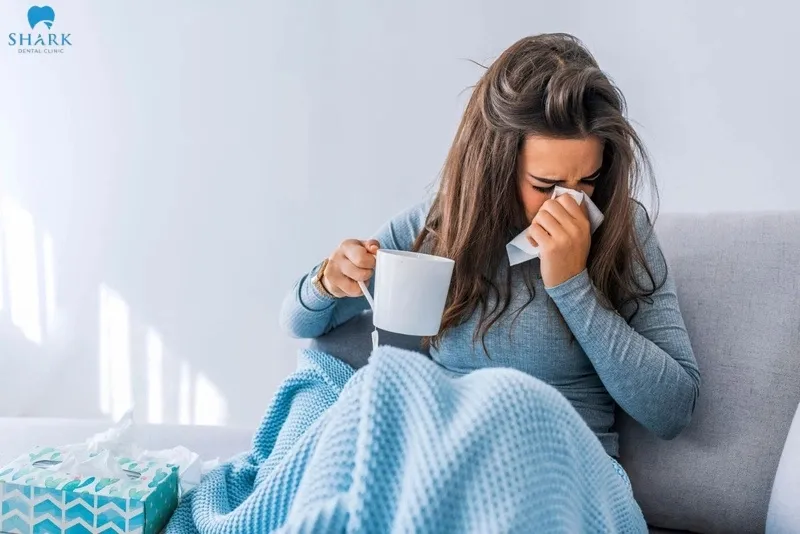 11 dấu hiệu nhiễm trùng sau khi nhổ răng khôn bạn nên biết 14 Nhiễm trùng sau khi nhổ răng khôn khiến cơ thể cảm thấy mệt ỏi, ớn lạnh kéo dài
