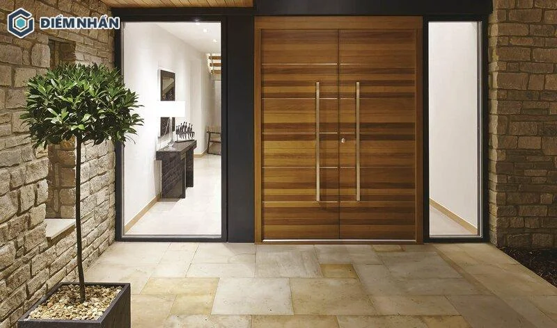 Cửa 2 cánh làm từ gỗ tự nhiên cao cấp mang đến vẻ đẹp đẳng cấp và thượng lưu