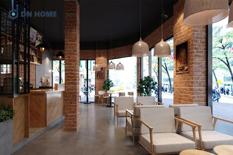 Chất liệu thô như gạch và kim loại được sử dụng phổ biến trong thiết kế quán cafe 2 tầng công nghiệp 