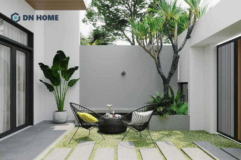 Một góc sân vườn nhỏ, thiết kế đơn giản nhưng giúp các thành viên trong gia đình nạp lại năng lượng hiệu quả