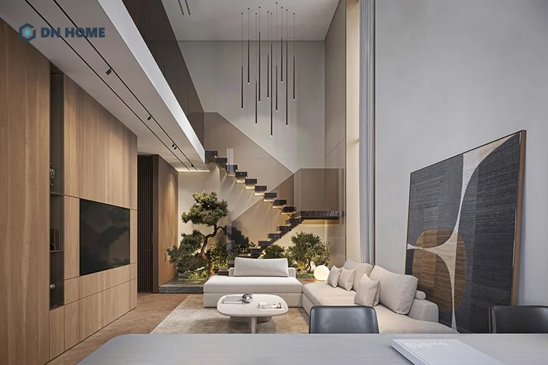 Tùy thuộc vào diện tích của phòng khách mà bạn lựa chọn loại cây kết hợp cùng cầu thang phù hợp