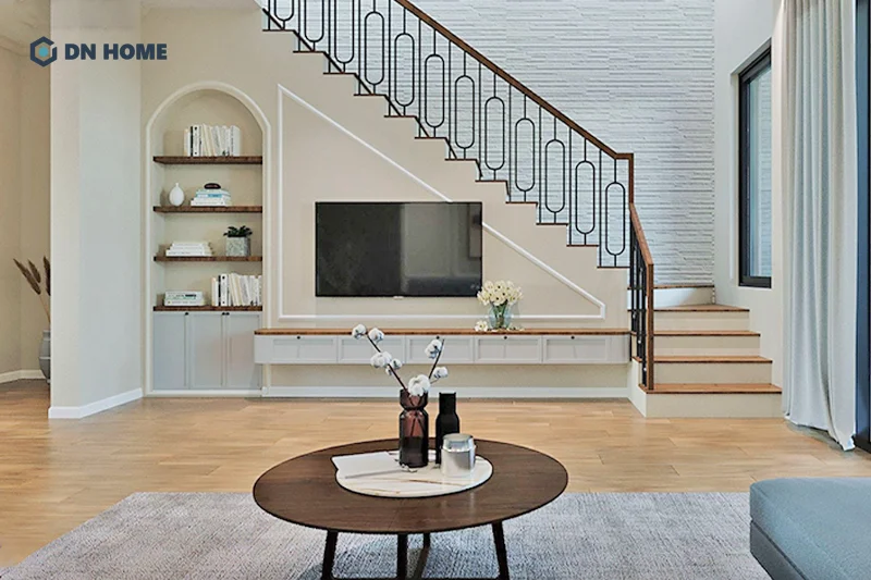 Có thể kết hợp thêm kệ tủ trưng bày để tạo điểm nhấn cho thiết kế tivi dưới gầm cầu thang phòng khách