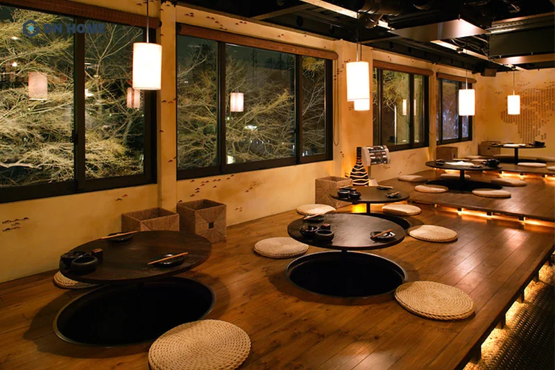 Một kiểu bàn ngồi bệt gấp gọn thông minh, có thể nâng lên hạ xuống sàn tùy vào nhu cầu sử dụng