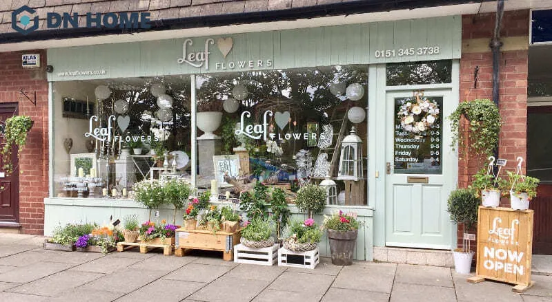 Bảng hiệu shop hoa tươi với gam màu xanh nhẹ nhàng