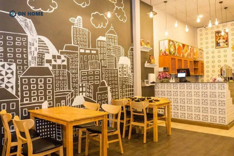 Sử dụng giấy dán tường là cách decor quán ăn vặt đơn giản, tiết kiệm nhưng vẫn hiệu quả