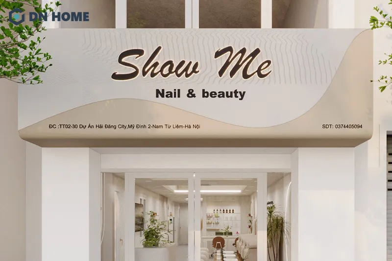 Đường cong uốn lượn trên bảng hiệu tiệm nail tạo điểm nhấn thẩm mỹ