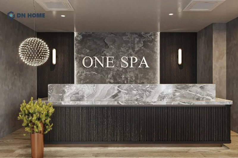 Sự kết hợp hài hòa về màu sắc và chất liệu giúp làm tăng tính thẩm mỹ khu vực quầy lễ tân